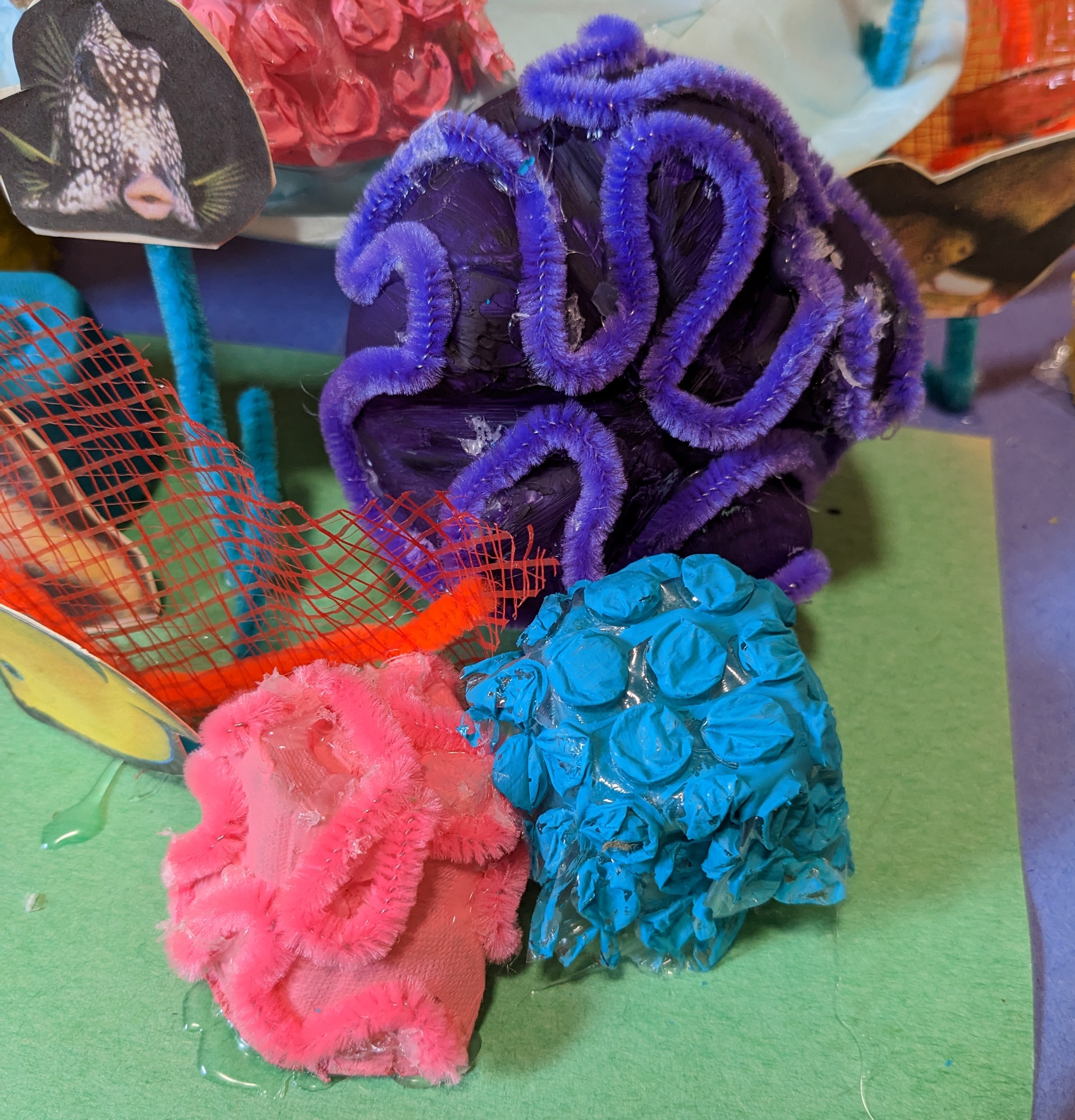 Brain corals made with pipe cleaners.