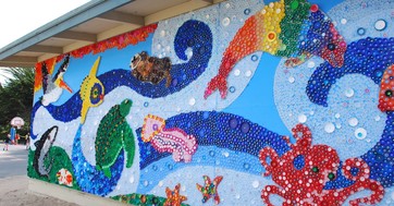 A mural made of bottle caps.