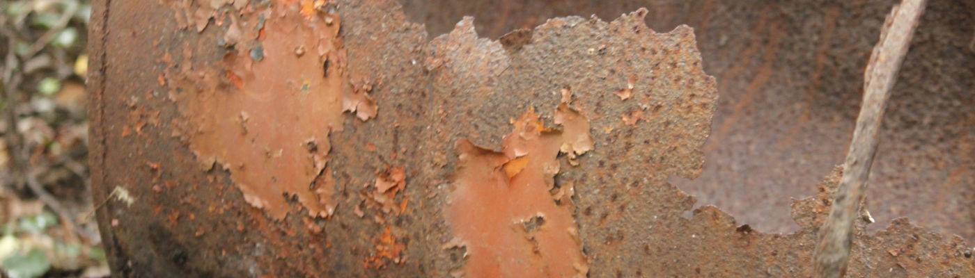 A jagged piece of corroded metal debris pulled from the water.