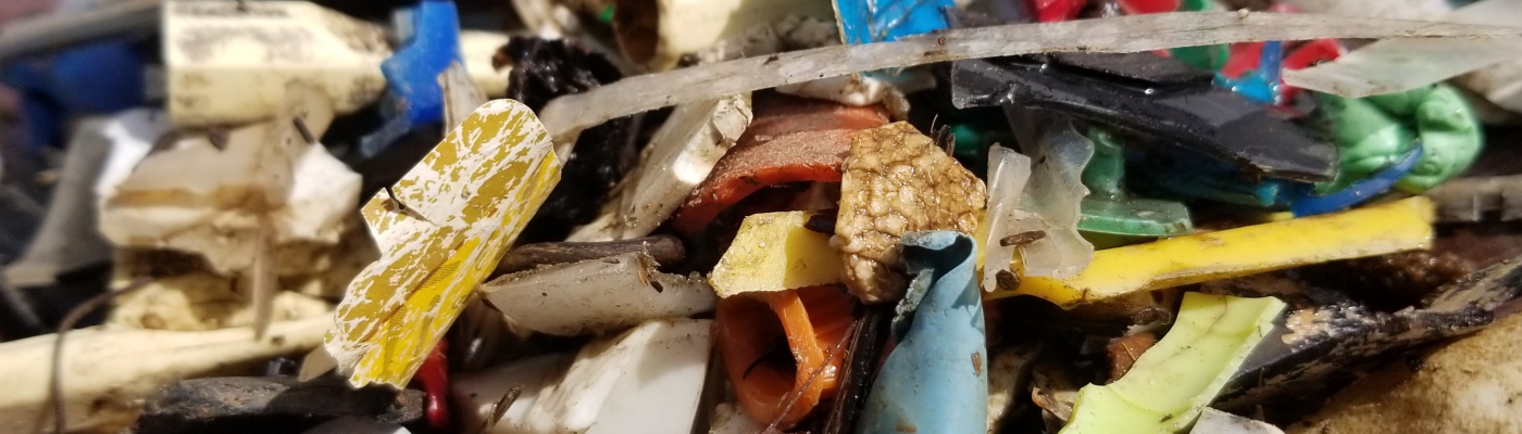 A pile of assorted shapes and sizes of plastic fragments.