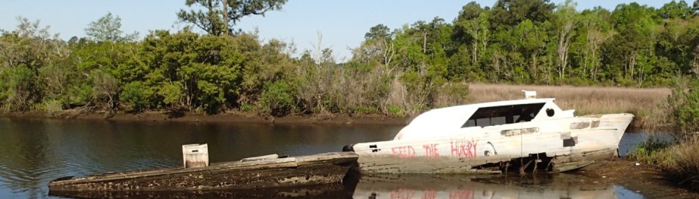 Derelict vessel in Dog River, Alabama
