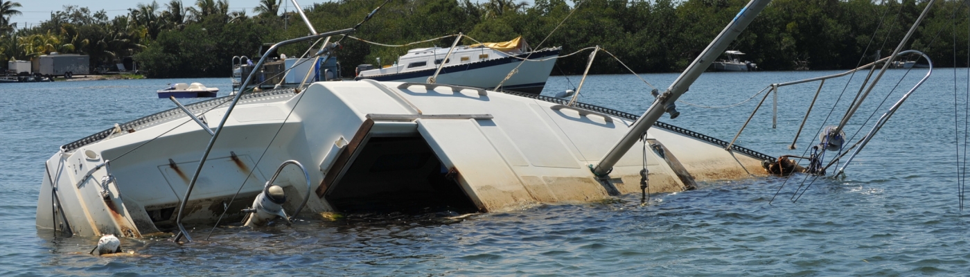 Derelict boat sinking.