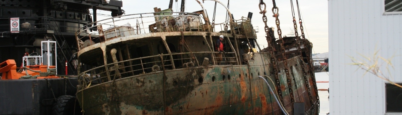 The Helena Star being lifted from the Hylebos waterway in Washington