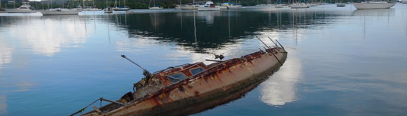 Derelict boat in Coral Bay