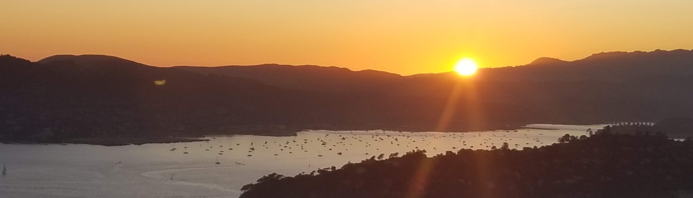 A view from high up looking over Richardson Bay in California during a sunrise.