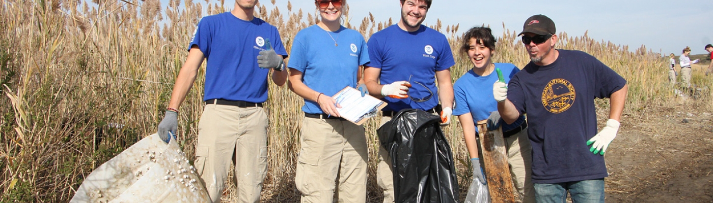 Volunteers remove debris from Jamaica Bay. Credit: ALS