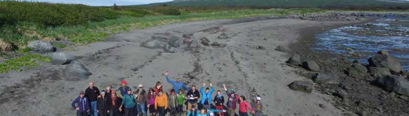 Students on beach on Alaska.