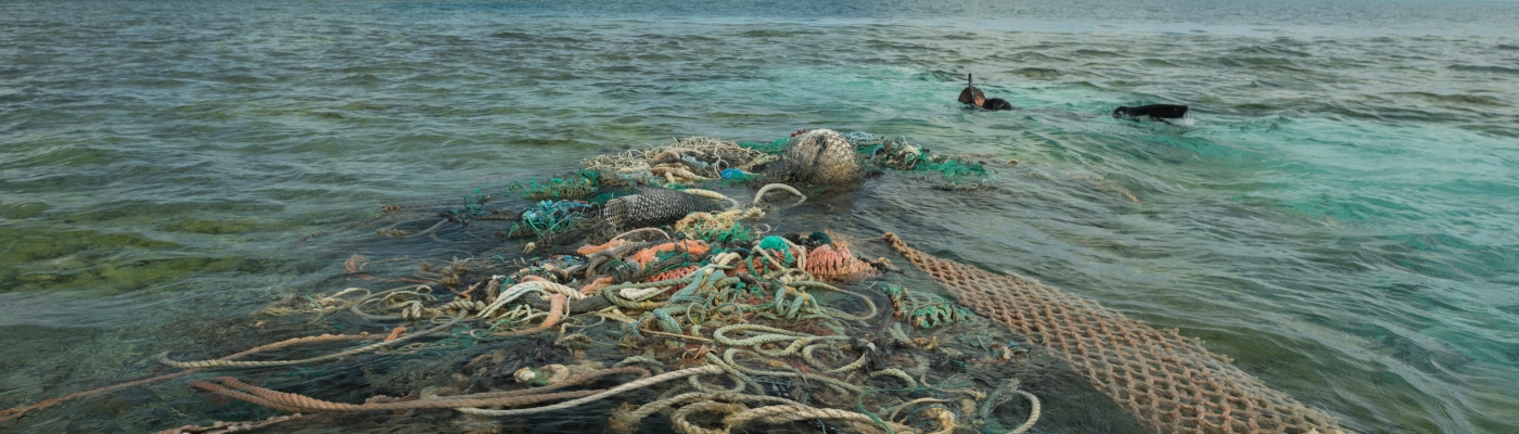 A tangle of derelict nets float on top of the water located near Hawaii.