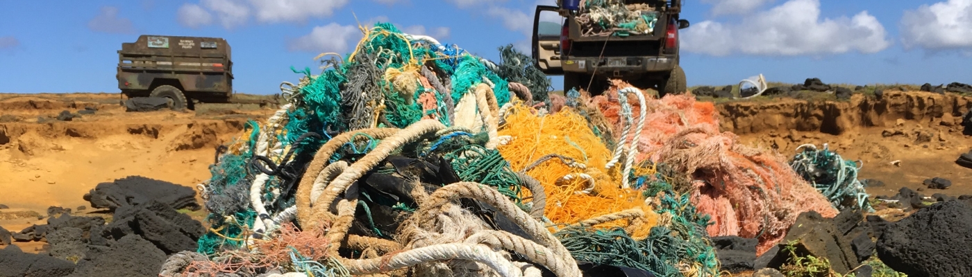 Pile of derelict fishing gear on a beach. 