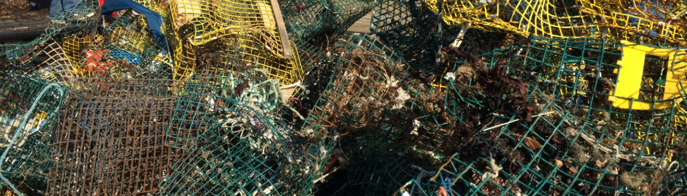 A pile of derelict crab traps. (Photo Credit: G. Bradt, NH Sea Grant)