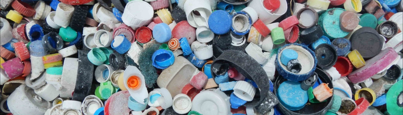 A large pile of plastic bottle caps.