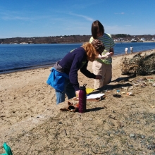 Counting Debris found along the shoreline.