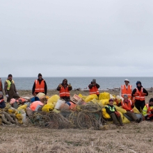 Community members gathered with the results of a shoreline cleanup on St. Paul Island in 2019.