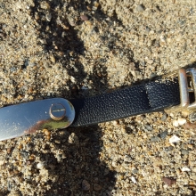 Leather bracelet found on the beach in California. Though there is metal on the bracelet, the majority of the bracelet is made of leather, so this item is classified as other/unclassified.