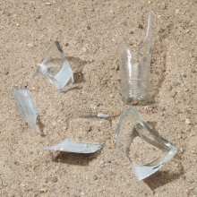Broken glass fragments found on the beach.