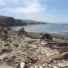 A rocky beach on Santa Rosa Island in California is littered with marine debris.