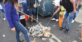 Students collect and sort trash.