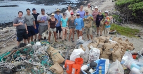 HWF volunteers removing debris from Kamilo. 