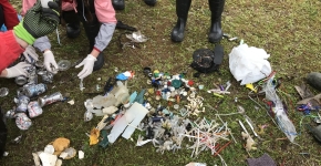 A collection of marine debris items collected and sorted by type.