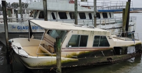 A derelict vessel in an inlet.