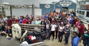 A group of students on a pier.