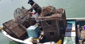 A fishing vessel loaded with derelict fishing gear.