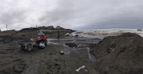 Wildlife staff removing marine debris along the shore of the North Slope Borough of Alaska.