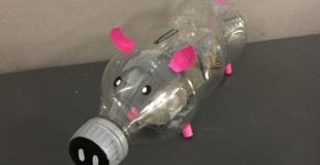 A piggy bank made from a plastic bottle.