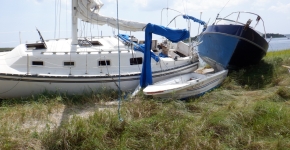 Three derelict vessels washed ashore. 