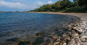 A rocky lake shoreline.