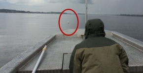 SCNDR Field Biologist Watches a Float. 