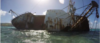 During the Typhoon Soudelor in 2015, the Lady Carolina broke free from its mooring and has since been a fixture in the Saipan Lagoon (Photo: Pacific Coastal Research & Planning).