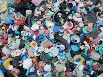 A large pile of plastic bottle caps.