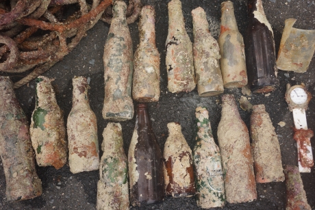 Marine debris, especially old glass bottles, found in Fajardo Bay.