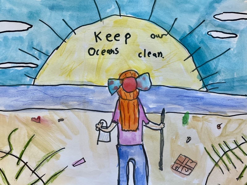 A peaceful beach scene featuring a person with long red hair looking over the ocean while picking up debris, artwork by Hazel P. (Grade 3, Florida), winner of the NOAA Marine Debris Program Art Contest.