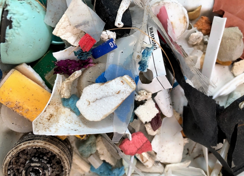 A close up view of microplastics in a pile on a table.