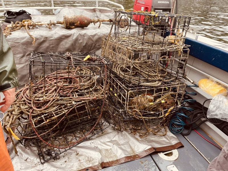 Derelict crab traps on a boat.